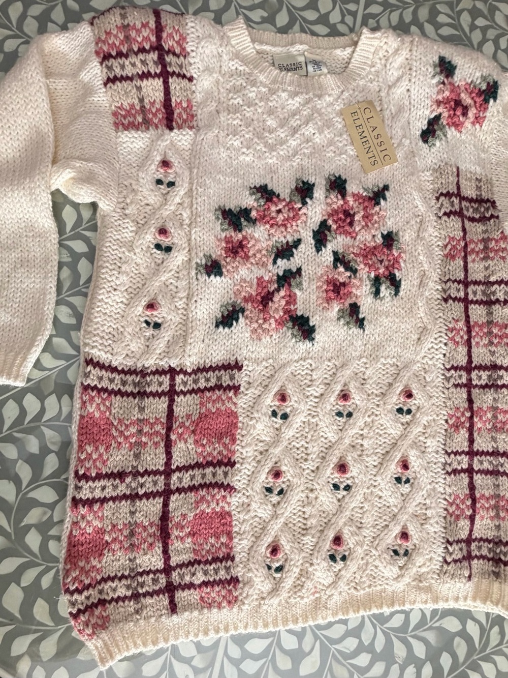 Classic Cream Knit Sweater with Pink Rose Motifs and Plum Plaid